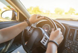 Driver's hands and steering wheel